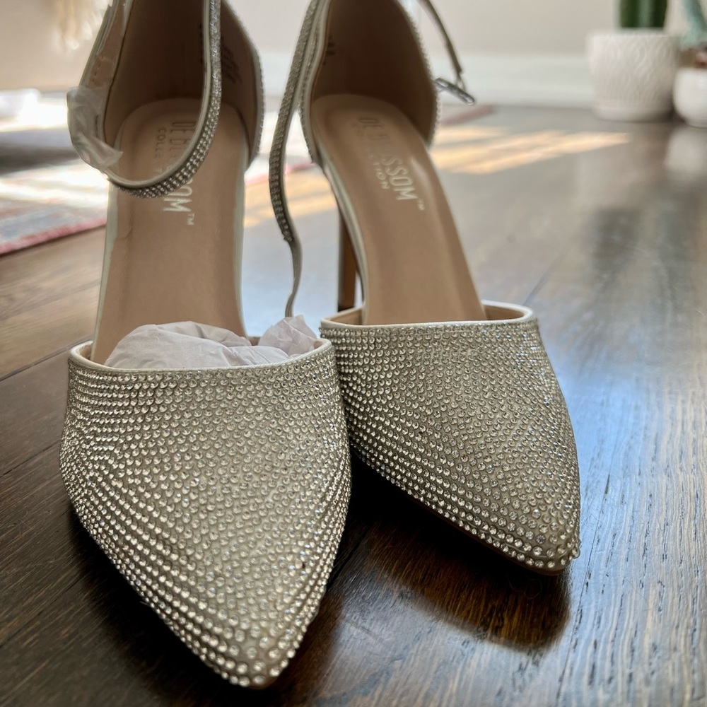 Brand new, size 6, close-toed sparkly heels